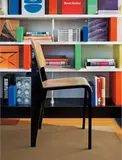 Jean Prouvé, "Semi-metal" chair, model no. 305, circa 1950, Bent oak plywood, painted steel, aluminum, plastic