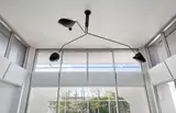 Three-armed ceiling light with "Casquette" shades by Serge Mouille, designed 1958, executed 1990s, Painted aluminum, painted steel, brass, sold Dec 2016