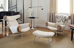 Pair of "Ox" lounge chairs, model no. AP-46, and ottoman, model no. AP-49 by Hans J. Wegner, 1960s, Fabric, leather, matte chromium-plated steel, sold Dec 2016