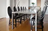 Josef Hoffmann, Set of fourteen dining chairs, 1980s, Painted and bent beech, stained beech plywood, leather, brass