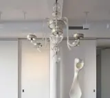 Syrie Maugham, Chandelier, 1920s, Blown glass, silver-plated metal, foil-backed glass