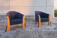 Michael Graves, Pair of lounge chairs, circa 1980, Bird's eye maple-veneered wood, ebony, fabric