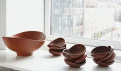 Serving bowl, together with twelve small bowls by Finn Juhl, 1950s, Teak, sold Dec 2016