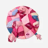 Trevon Latin, Knead myself (pink), 2021, found fabric, sequins, upholstery over panel