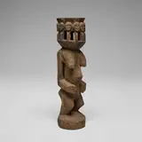 Dogon, Female figure with eleven heads, carved wood with ritual encrustation