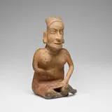 Jalisco, Seated female figure, terracotta with ochre pigment