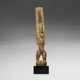 Dogon, Tellum figure with raised arms, carved wood with encrustation
