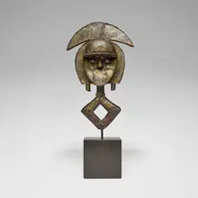 Kota, Mbulu Ngulu reliquary guardian figure, hammered copper, wood, iron, brass, leather