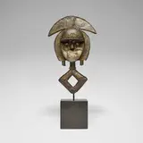 Kota, Mbulu Ngulu reliquary guardian figure, hammered copper, wood, iron, brass, leather