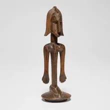Bamana, Female ancestor stopper for vessel, carved wood, copper