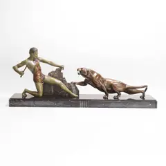 J... Brault, Bronze and patinated group, mounted on a marble plinth