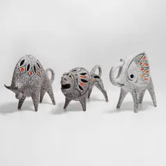 Roberto Rigon, Lion, an elephant, and a bull, each modelled with a pierced body and a 'smalto sasso' glaze