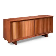 DOUBLE SLIDING DOOR CABINET by George Nakashima, 1961, walnut, sold Feb 2025