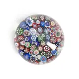 France, late 19th century, ht. 2, dia. 2 1/2 in. by Baccarat Close-Packed Millefiori Paperweight, offered Feb 2025
