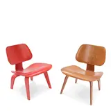 Charles Eames and Ray Eames, Red Analine LCW Chair and LCW Chair, for Evans Products/Herman Miller, molded plywood, rubber, the red chair with an Eames/Herman Miller black tag