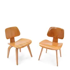 Two Early DCW Chairs by Charles Eames and Ray Eames, for Evans Products/Herman Miller, molded plywood, rubber, sold Oct 2025