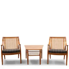 Pair of FD-146 Easy Chairs and Side Table by Peter Hvidt & Orla Mølgaard-Nielsen, , teak, cane, plastic and metal cording, upholstery, sold Oct 2025