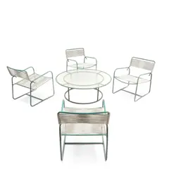 Walter Lamb, Four Lounge Chairs and Round Coffee Table, for Brown Jordan, bronze tubing, rubber cord, glass
