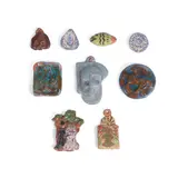 Beatrice Wood, Group of Nine Pendants, sculpted and glazed earthenware, three pendants signed 'BEATO'