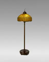 Tiffany Studios, 'Curtain Border' Floor Lamp, leaded glass, patinated bronze, the shade stamped 'Tiffany Studios New York, 0615', the base stamped 'Tiffany Studios NEW YORK 377'