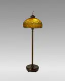 'Curtain Border' Floor Lamp by Tiffany Studios, leaded glass, patinated bronze, the shade stamped 'Tiffany Studios New York, 0615', the base stamped 'Tiffany Studios NE, sold Jun 2025