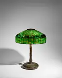 'Geometric and Turtleback Tile' Table Lamp by Tiffany Studios, leaded glass, patinated bronze, shade stamped 'TIFFANY STUDIOS NY 7489', base stamped 'TIFFANY STUDIOS 9931', sold Jun 2025