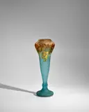Vase by Cristallerie Daum, glass, overlaid and acid-etched and enameled glass, decorated with laburnum flowers, cameo mark 'Daum Nancy' and Cross o, offered Jun 2025