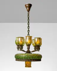 Hanging Lamp by Tiffany Studios, leaded glass, patinated bronze, favrile glass, shades engraved 'L, sold Jun 2025