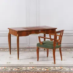 Bureau et son fauteuil by Jules Leleu, A desk and its signed and numbered armchair in Indian rosewood, sipo, walnut, brass, leather and fabric by Jules Leleu i, offered Oct 2025