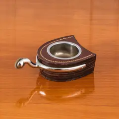 Paul Dupré-Lafon, Cendrier Éperon, A signed and numbered 'Éperon' ashtray in full leather, stitched leather and nickel-plated brass by Paul Dupré Lafon for Hermès circa 1940