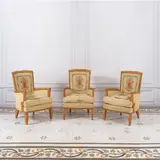 Jules Leleu, Suite de trois fauteuils, A set of three signed and numbered armchairs in walnut and Aubusson upholstery by Jules Leleu in 1943