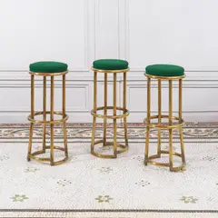 Suite de trois tabourets hauts by Jules Leleu, A set of three high stools in gold-finish tubular steel and felt by Jules Leleu in 1944, sold Oct 2025