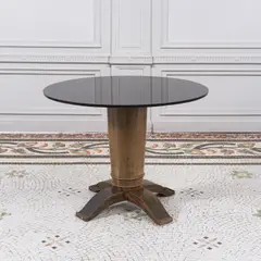 Jules Leleu, Guéridon circulaire, A circular coffee table in walnut, okoume and tinted glass aby Jules Leleu circa 1942-46