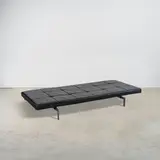 Lit de repos PK80 by Poul Kjaerholm, A marked 'PK80' daybed in chrome-plated steel, lacquered plywood, leather and rubber designed by Poul Kjaerholm in 1957 , offered Oct 2025