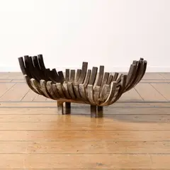 Panier à feu by Ado Chale, A log basket in wrought-iron designed by Ado Chale in 1970, sold Oct 2025
