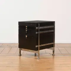 Caisson by Jules Wabbes, A storage unit in stained anigre, teak, chrome-plated steel and melaminate by Jules Wabbes circa 1960 and edited by Mobi, sold Oct 2025