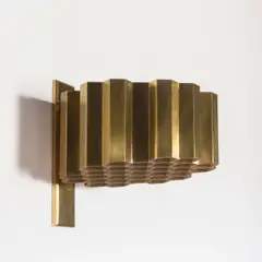 Jules Wabbes, Applique Nid d'abeilles, A 'Nid d'abeilles' sconce in brass designed by Jules Wabbes in 1953 and edited by Général Décoration