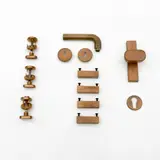Jules Wabbes, Ensemble de douze éléments de serrurie, A set of twelve locksmithing elements in patinated mold brass by Jules Wabbes and edited by Général Décoration circa 1970