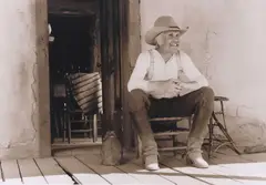William D. Wittliff, Gus on the Front Porch, sepia-toned gelatin silver print on paper