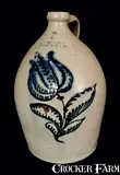 C. W. Braun, C. W. BRAUN / BUFFALO, NY Stoneware Jug with Elaborate Slip-Trailed Flower