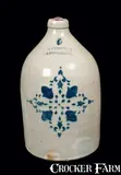 F.H. COWDEN / HARRISBURG Stoneware Jug w/ Stenciled Cross Decoration. by F.H. Cowden, circa 1880, Stoneware, sold Jul 2012