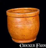 John W. Bell, Small Redware Cream Jar with Orange Glaze Signed JOHN W. BELL / Waynesboro, Pa, circa 1880, Redware