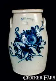 J. & E. NORTON / BENNINGTON, VT. Stoneware Churn with Floral Decoration by J. & E. Norton, circa 1855, Stoneware, sold Oct 2011