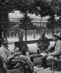 Robert Doisneau, Snack in the garden of Palais Royal in spring', Paris 1950, 1950, Gelatin silver print, printed in the 1950s on single-weight glossy paper