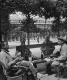 Robert Doisneau, Snack in the garden of Palais Royal in spring', Paris 1950, 1950, Gelatin silver print, printed in the 1950s on single-weight glossy paper