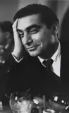 Ruth Orkin, Robert Capa at Magnum luncheon, Paris 1951, 1951, Gelatin silver print, printed in the late 1950s on double-weight glossy paper