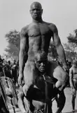 George Rodger, Victorious Nuba wrestler, Kordofan, Sudan 1949, 1949, Gelatin silver print, printed in 1995 on double-weight semi-matte paper