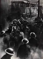 George Rodger, Woman rescued from her bombed home, London 1943, 1943, Gelatin silver print, printed in 1989 on double-weight semi-matte paper