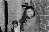 Werner Bischof, Refugee with G.I.s at Pusan train station, South Korea 1952, 1952, Gelatin silver print, printed in 1989 on double-weight semi-matte paper