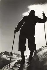 Paul Wolff, Skier in backlight in the Ötztal Alps, c. 1920s, Vintage silver print on double-weight ferrotyped paper, in good condition. Photographer's stamp "Dr. Paul Wolff, Frankfurt am Main", several handwritten numbers, "Ag. Schostal" agency label with handw